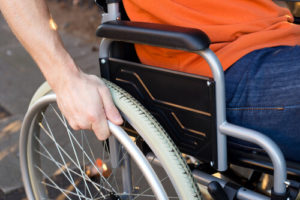 injured man in wheelchair