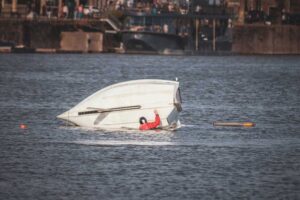 capsized boat in the water